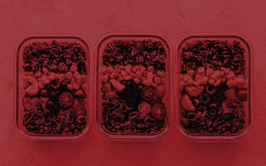 Three prepared meal boxes seen from above